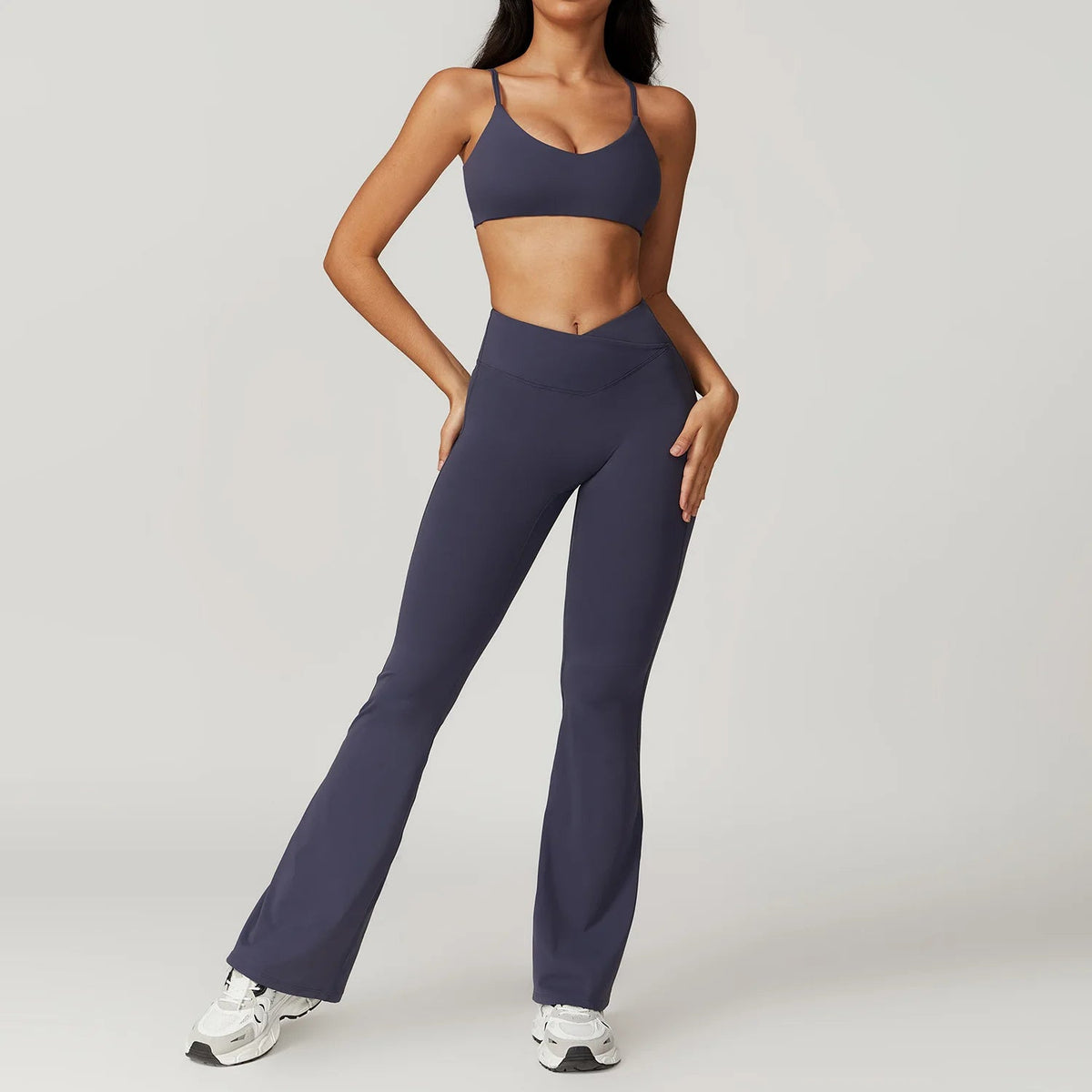 Two-piece women's fitness set with short sleeve crop top and gym leggings, by The Clothing Company Sydney, for yoga and sports.