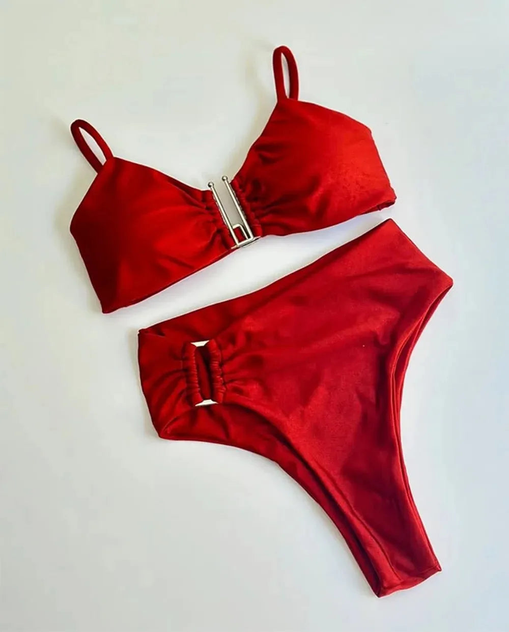 Two-piece bandeau bikini swimwear set with push-up top and thong bottoms, solid color, suitable for beachwear and swimming.