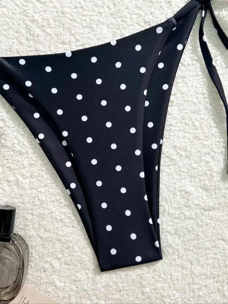 Black and white polka dot bikini set by The Clothing Company Sydney featuring a two-piece swimsuit for beachwear and swimwear.
