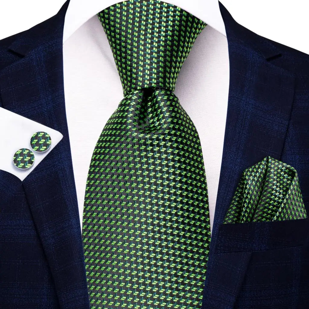 Green paisley silk tie set for men featuring a necktie, pocket square, and cufflinks from The Clothing Company Sydney.