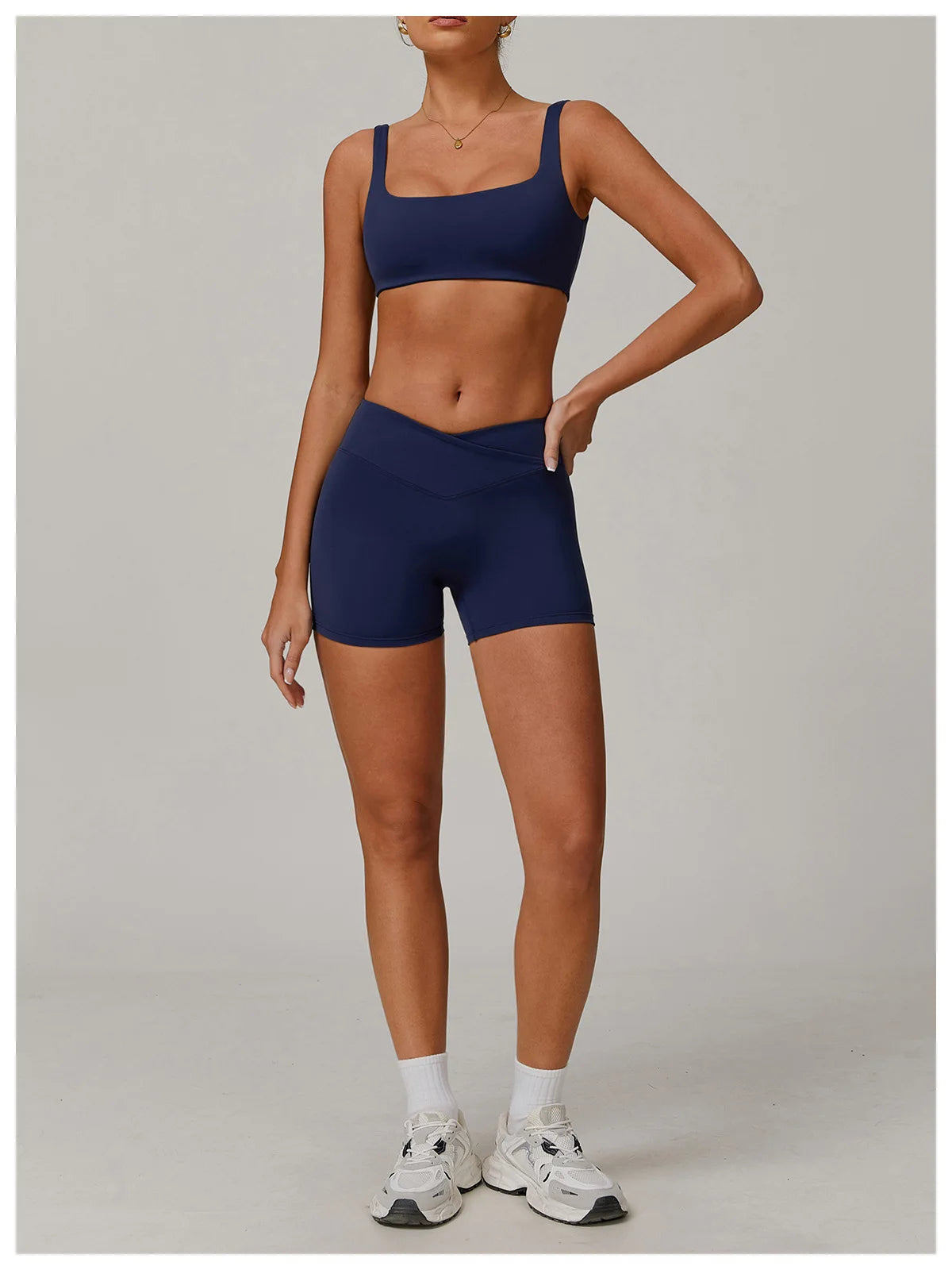 Two-piece women's yoga and workout set with sports bra and leggings from The Clothing Company Sydney, suitable for gym and running activities.