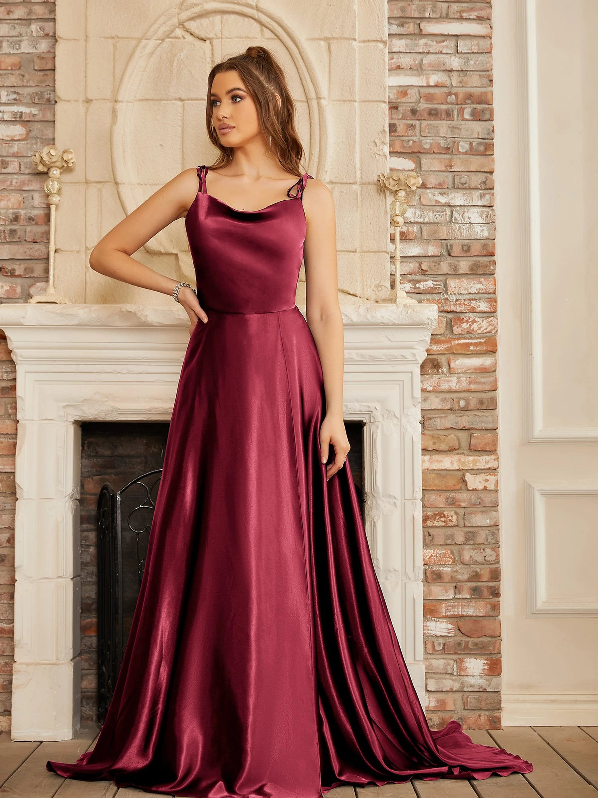 Mint green bridesmaid dress by The Clothing Company Sydney, backless satin gown with side slit and spaghetti straps for summer evenings.