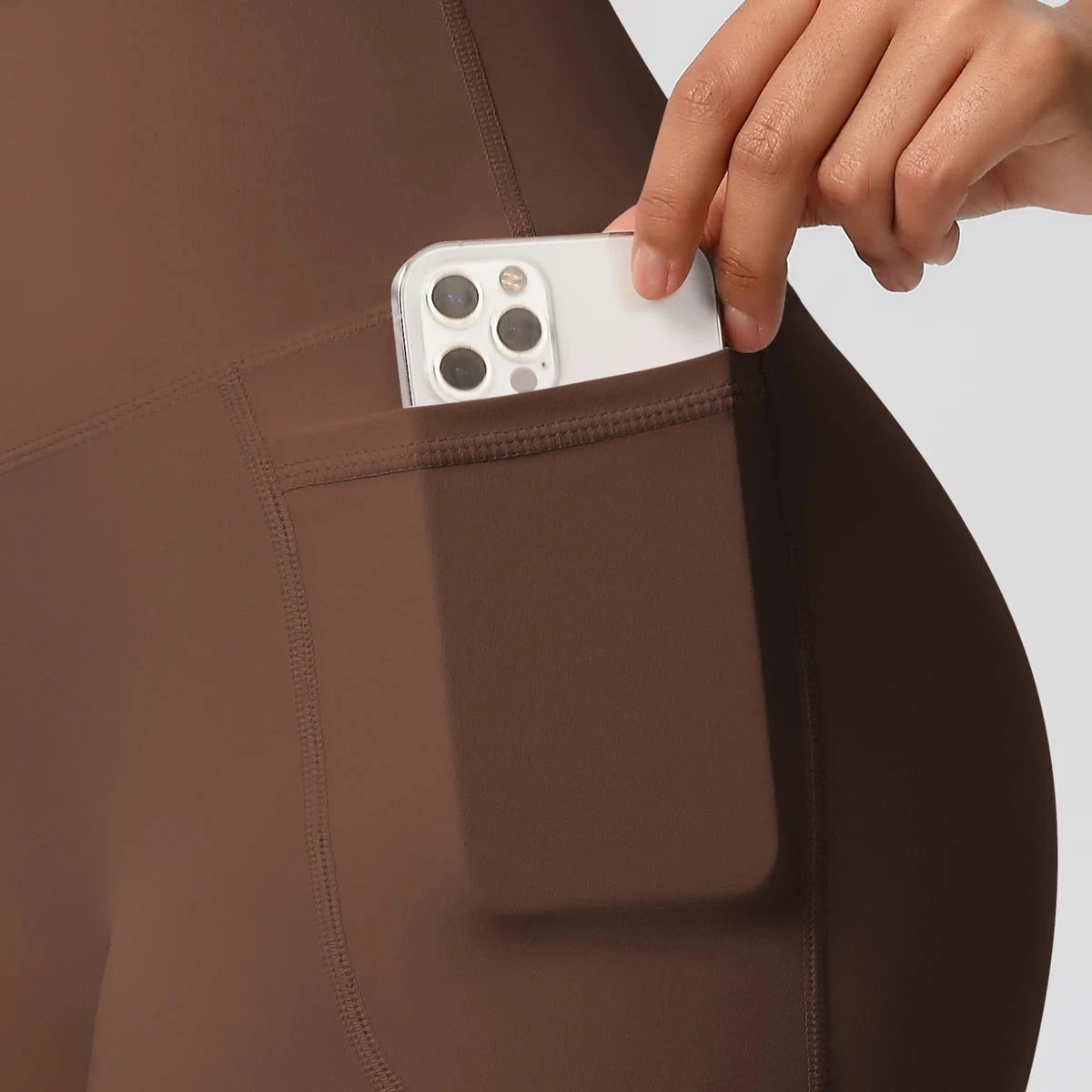 High-waisted women's bicycle yoga pants with pockets, quick-drying, breathable fabric, ideal for gym, workout, and fitness activities.