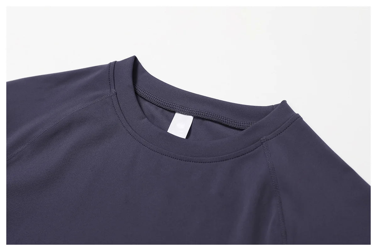 Two-piece women's fitness gym set with short sleeve crop top and leggings, by The Clothing Company Sydney, perfect for yoga and sports.