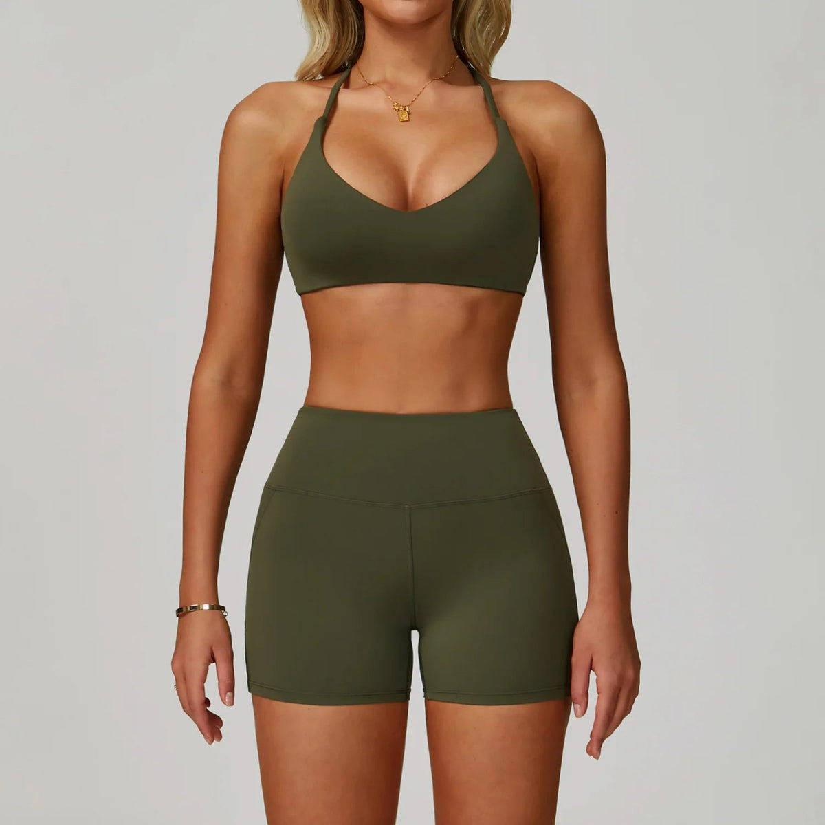 Women's fitness tracksuit set by The Clothing Company Sydney with high waist leggings and sports bra, ideal for yoga and workouts.