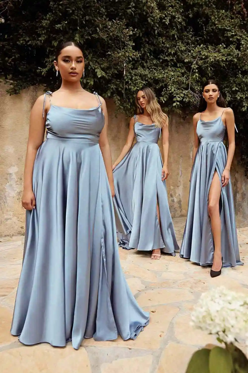 Mint green satin bridesmaid dress with side slit, backless design, spaghetti straps, long evening gown for summer weddings.