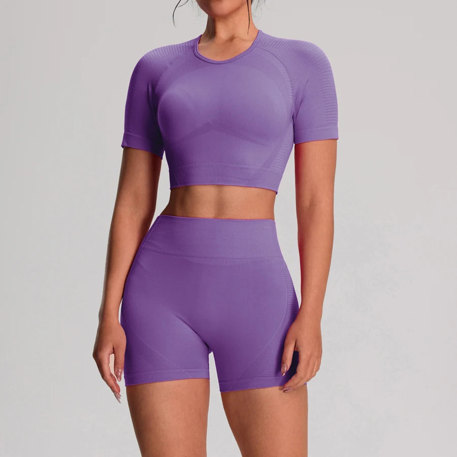 Women's fitness sportswear set including seamless workout vest and bike shorts from The Clothing Company Sydney, ideal for yoga and gym.