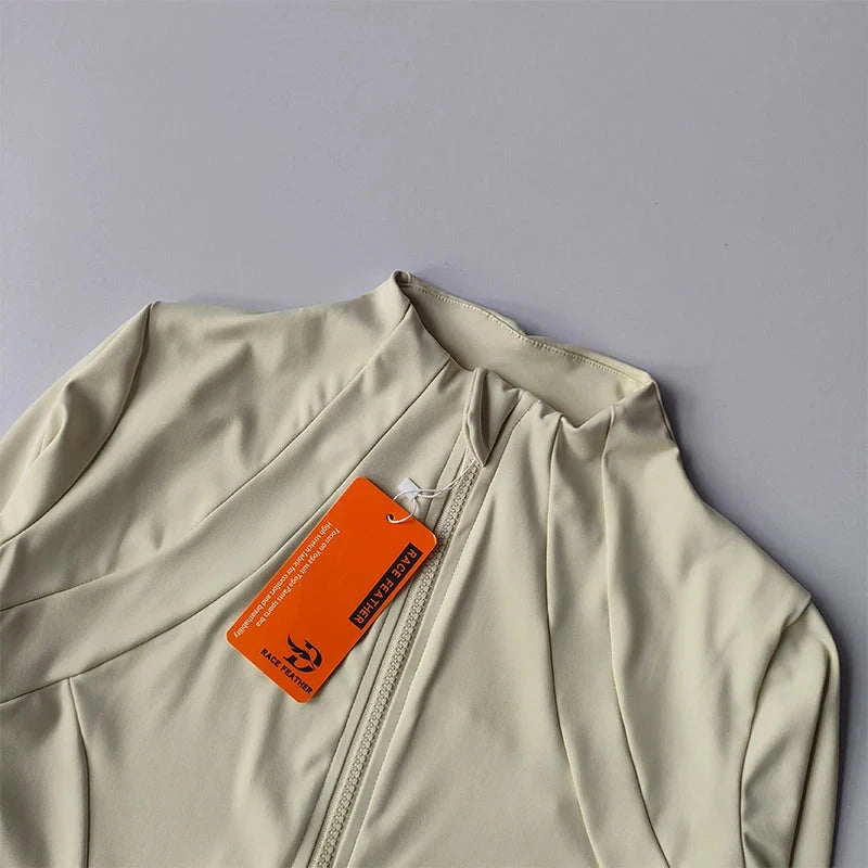 Women’s slim-fit sports jacket by The Clothing Company Sydney, long sleeve zip-up fitness and yoga workout top for activewear.