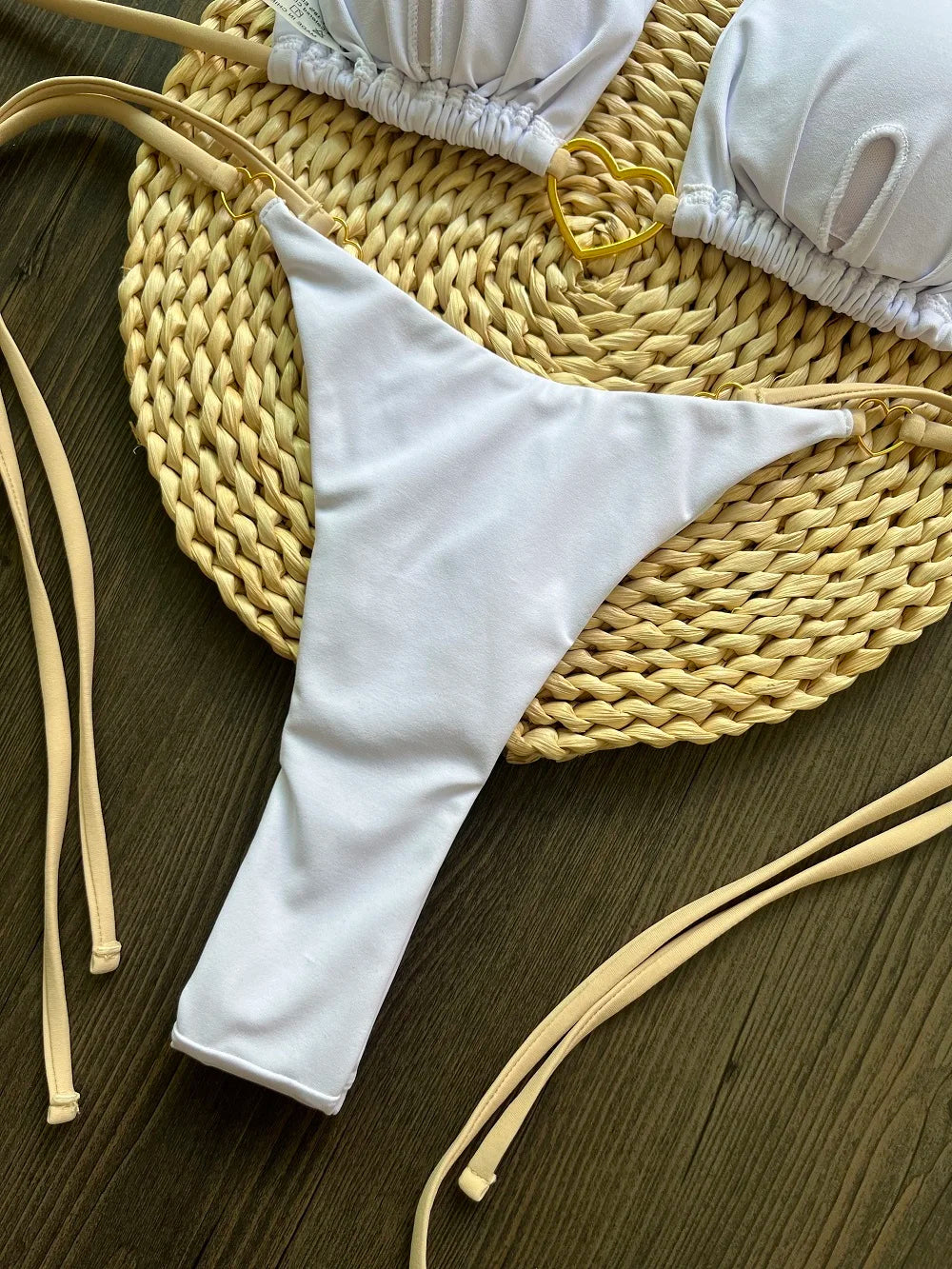 Solid color halter bikini set for women, two-piece swimsuit with triangle top and thong bottoms by The Clothing Company Sydney.