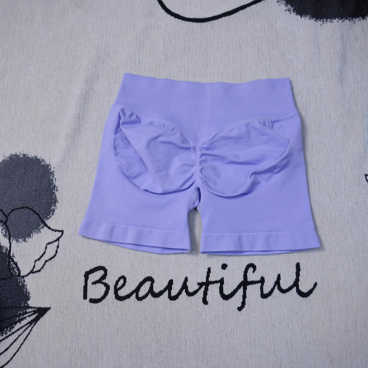Women's high-waisted seamless yoga shorts by The Clothing Company Sydney, breathable, butt-lifting, suitable for gym, running, and biking.