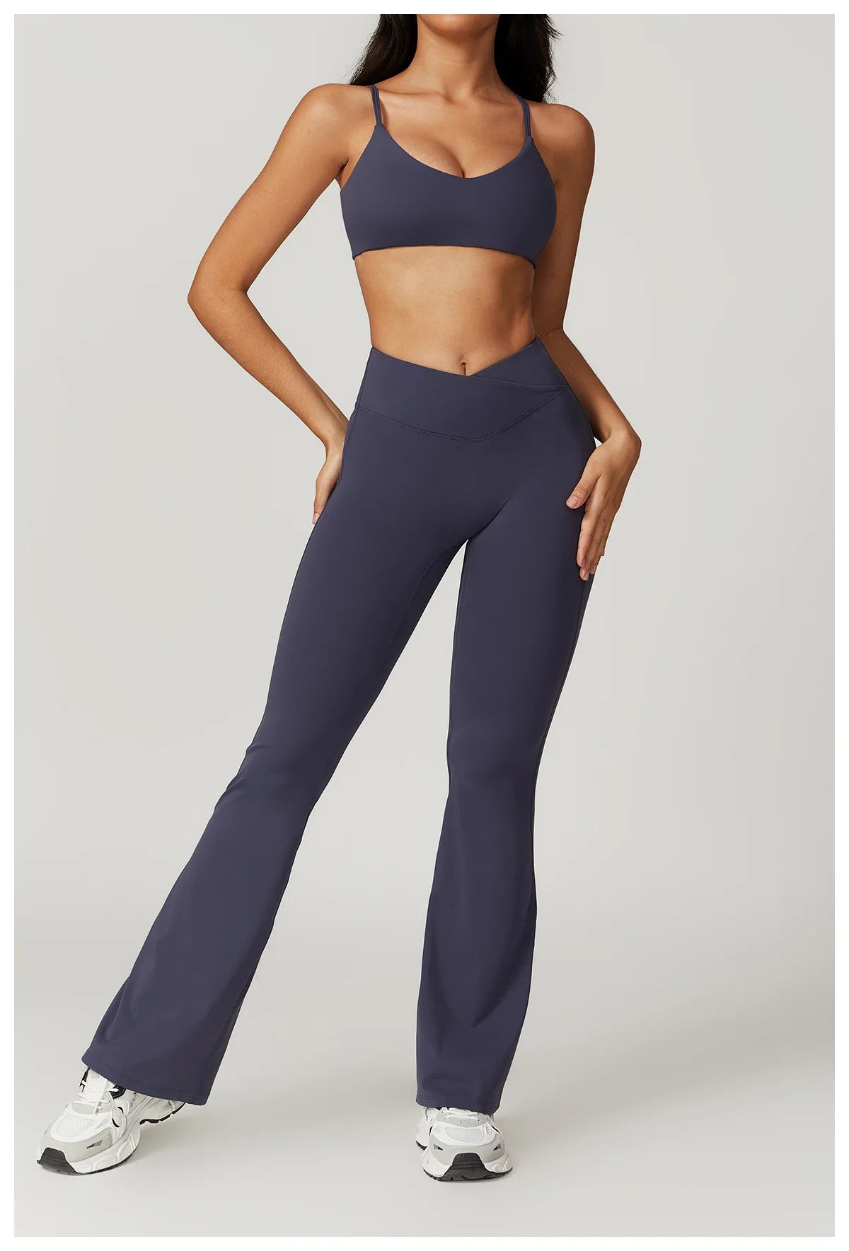 Two-piece women's fitness set with crop top, sports bra, and leggings from The Clothing Company Sydney, ideal for yoga and gym workouts.
