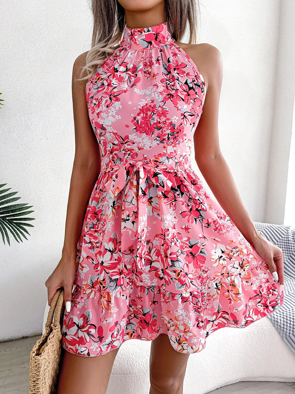 Summer women’s floral print halter sundress by The Clothing Company Sydney, featuring a bandage style and casual beach-ready design.