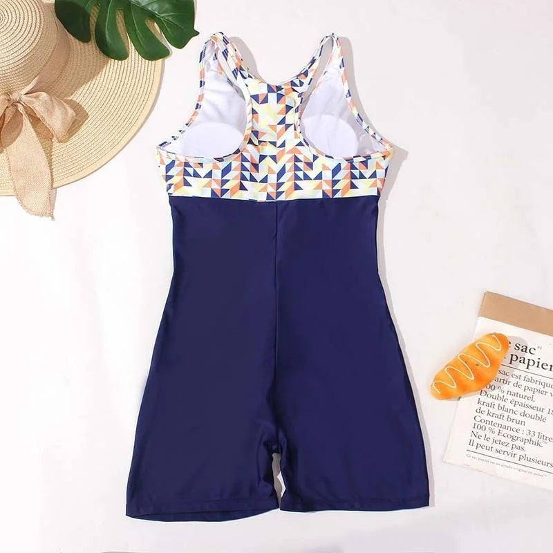 Women's closed one-piece swimsuit bodysuit in sporty swimwear style, front view; The Clothing Company Sydney