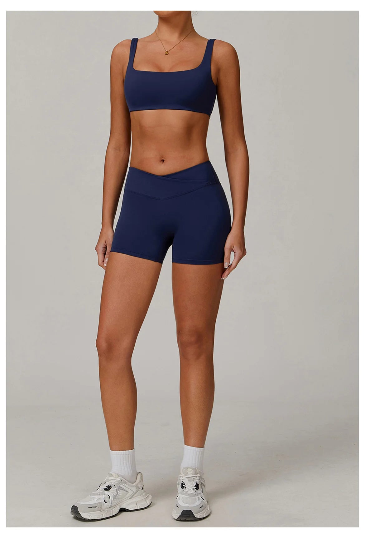 Two-piece women's yoga and workout set by The Clothing Company Sydney featuring a sports bra and leggings for fitness and running.