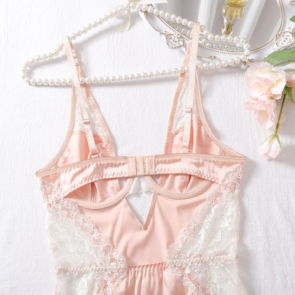 Deep-V neck satin lingerie slip dress with lace patchwork and split design, designed for women’s nightwear by The Clothing Company Sydney.