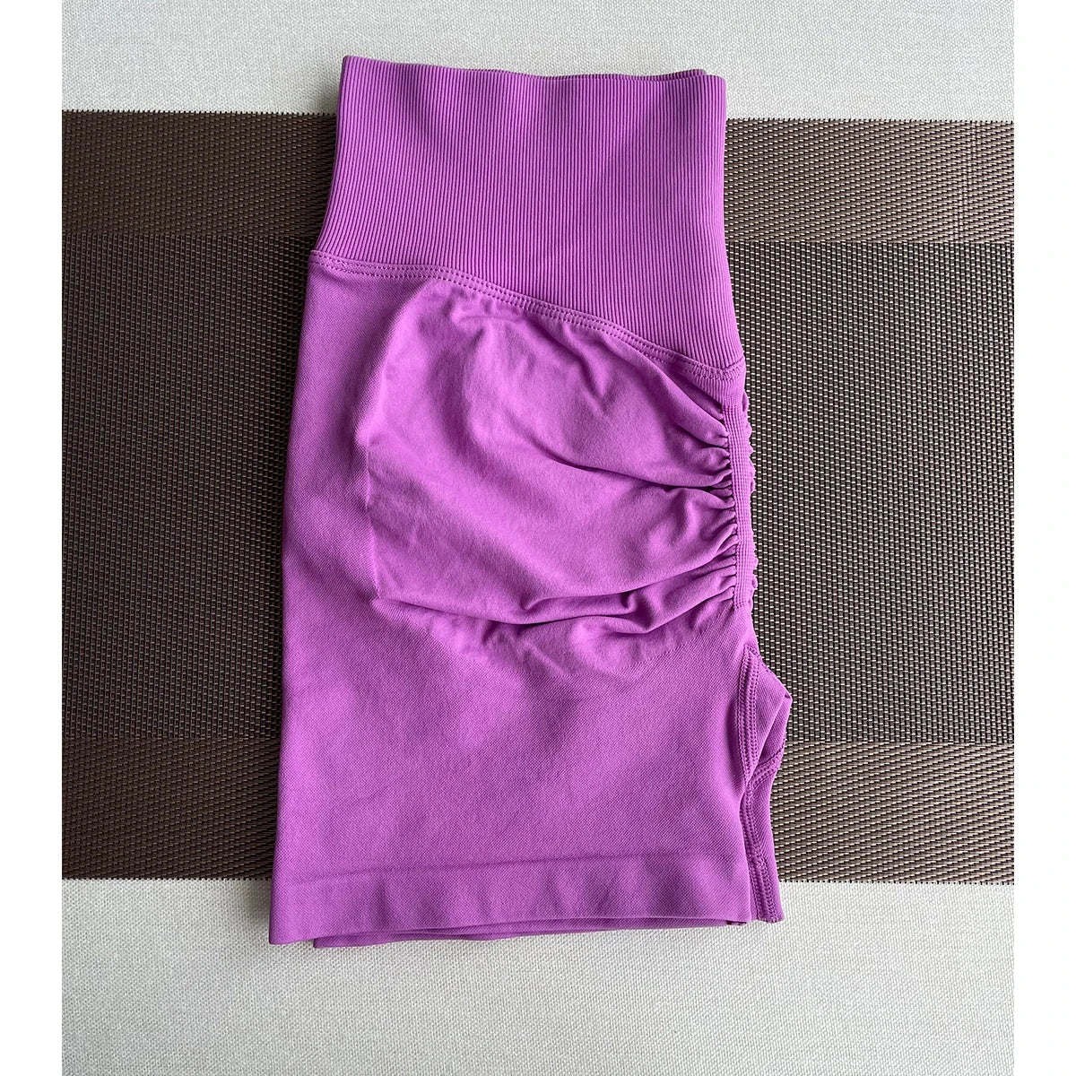 Solid seamless half pants for women by The Clothing Company Sydney, soft fitness wear for yoga, gym, running, and biking.