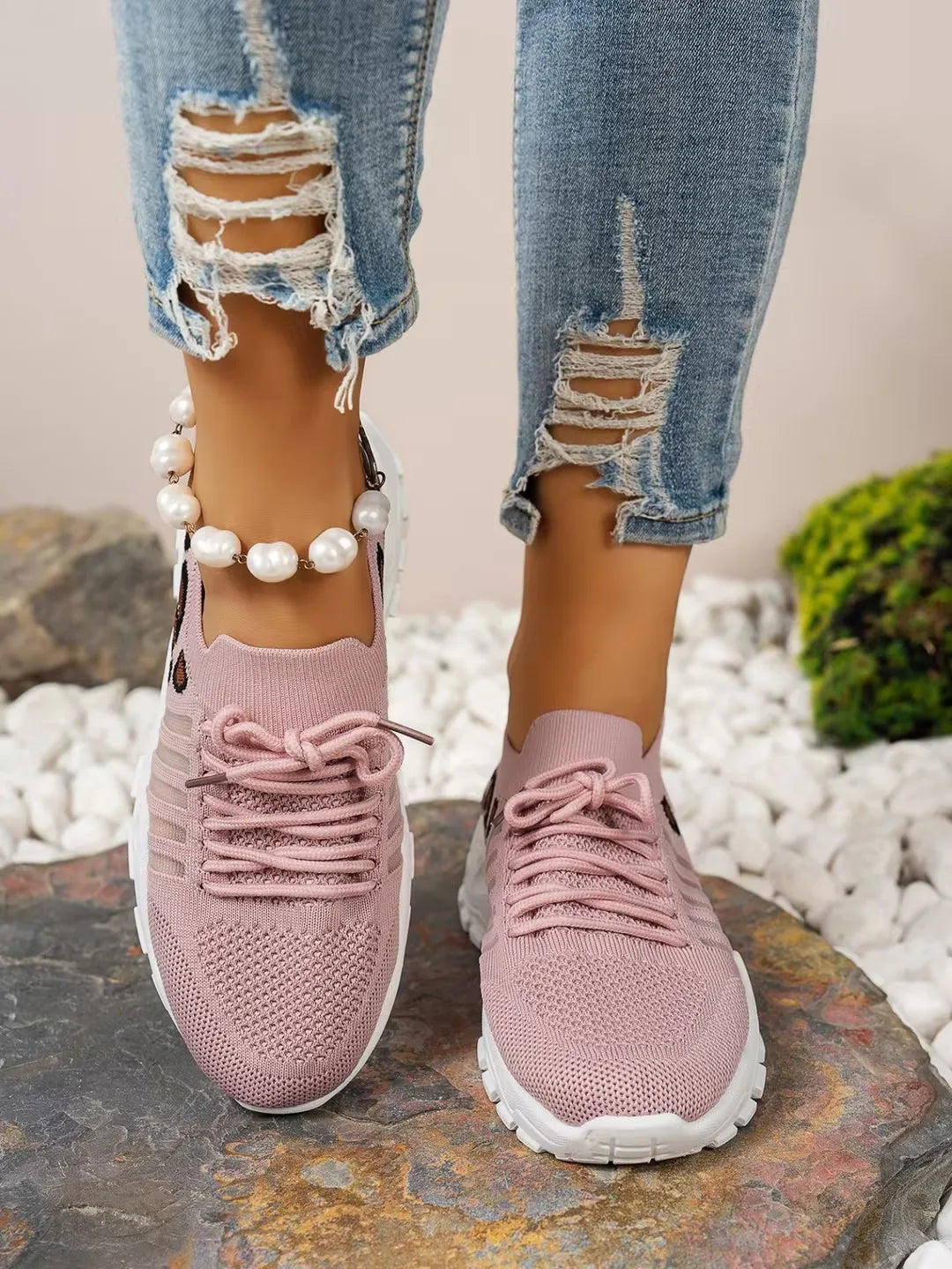 Leopard print women's waterproof sneakers by The Clothing Company Sydney, stylish footwear with a trendy animal pattern.