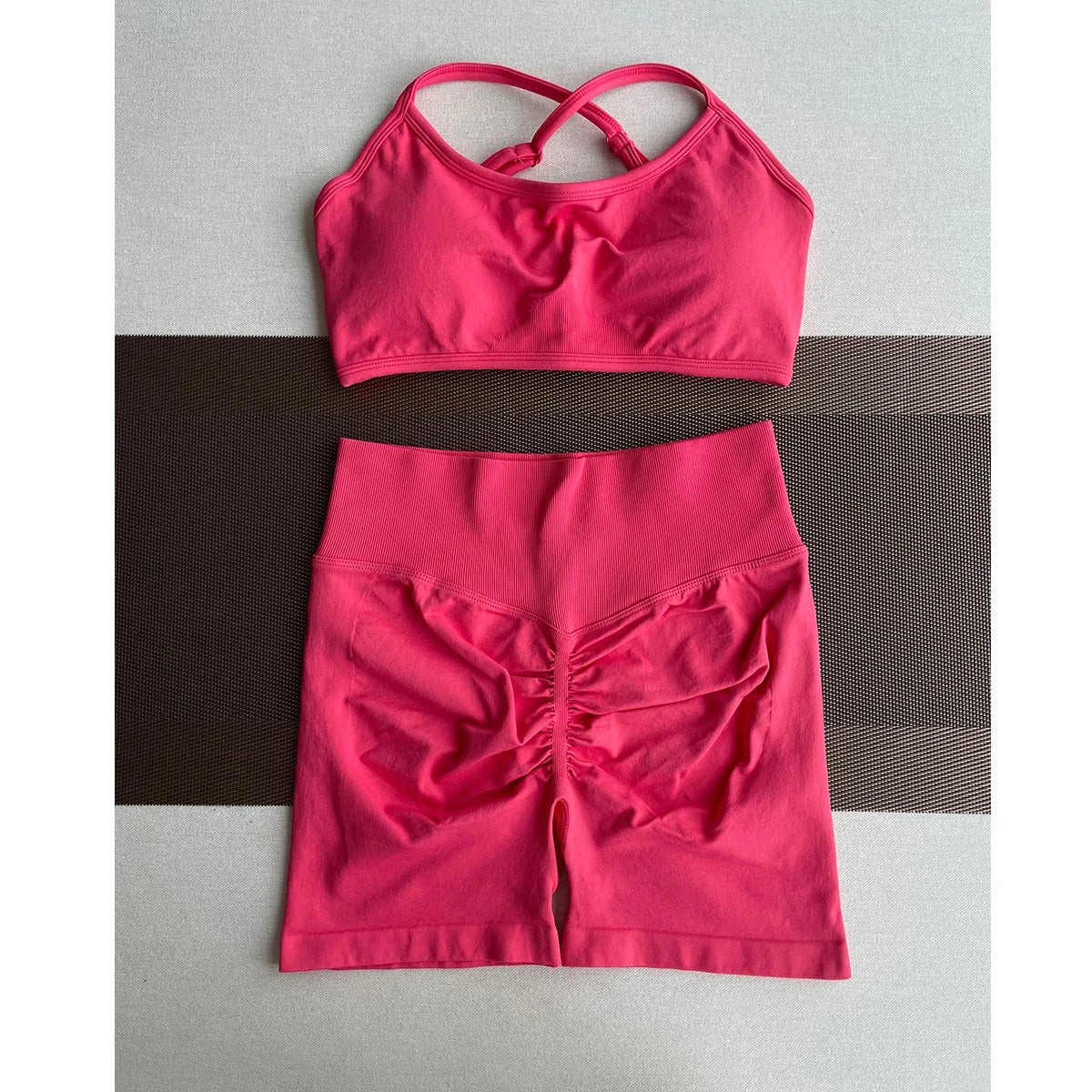 Solid seamless half pants for women by The Clothing Company Sydney, soft fitness shorts ideal for yoga, gym, running, or cycling.