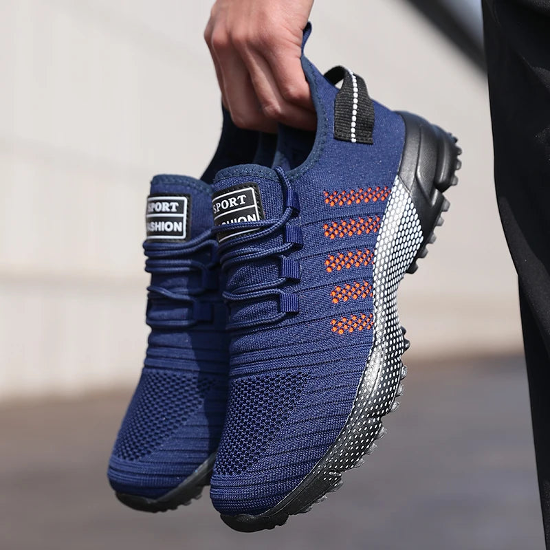 Men's casual sneakers from The Clothing Company Sydney, lightweight breathable mesh running shoes with soft soles and slip-on design.