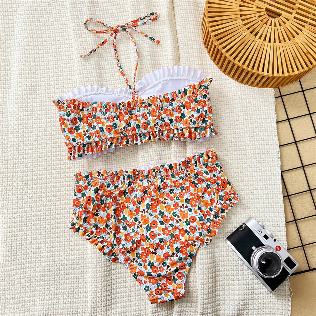 Floral print bandeau high waist swimsuit for women, two-piece bikini set with vibrant floral pattern, The Clothing Company Sydney.