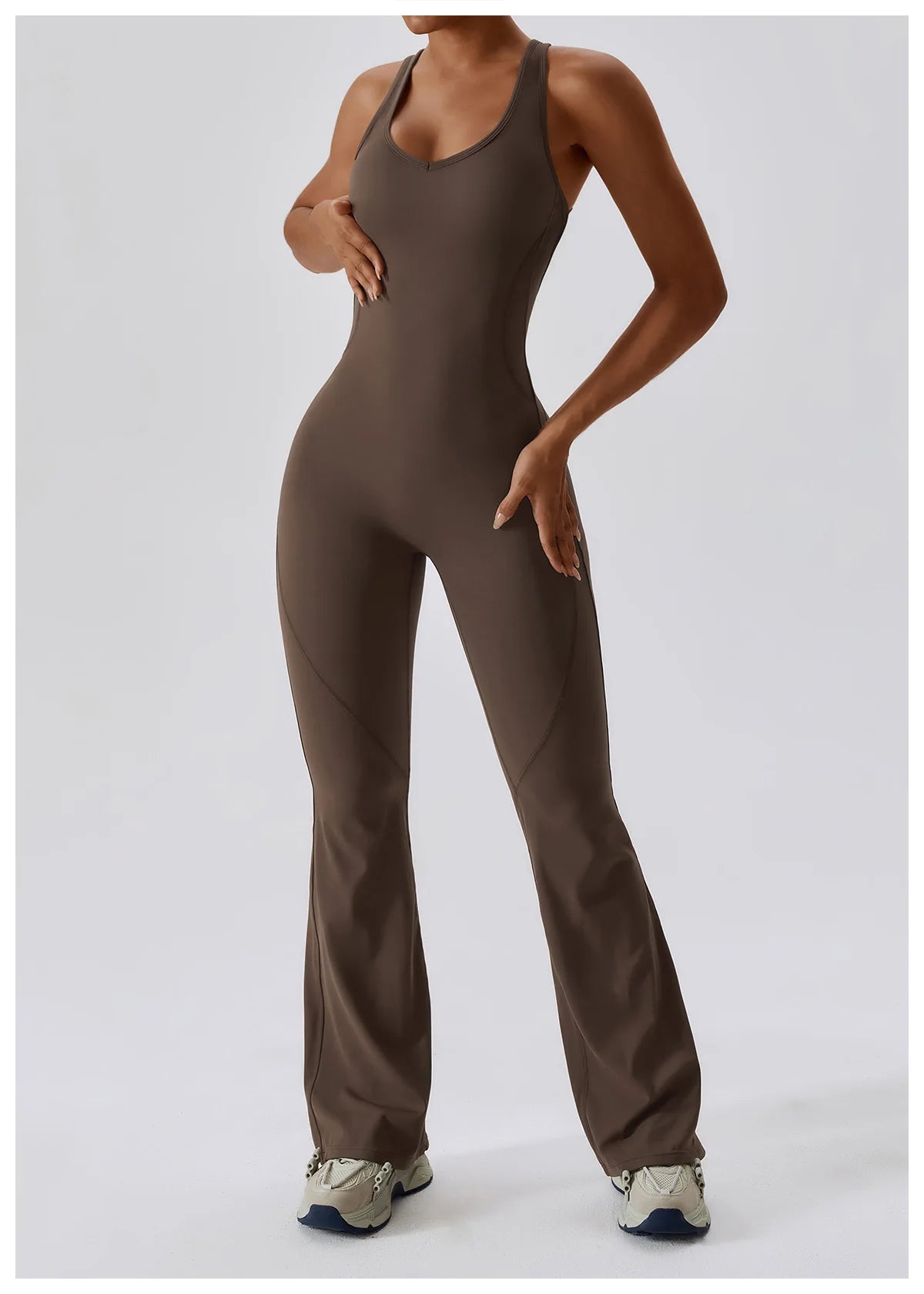Open back V jumpsuit gym set by The Clothing Company Sydney, designed for women’s yoga, fitness, and workout training.