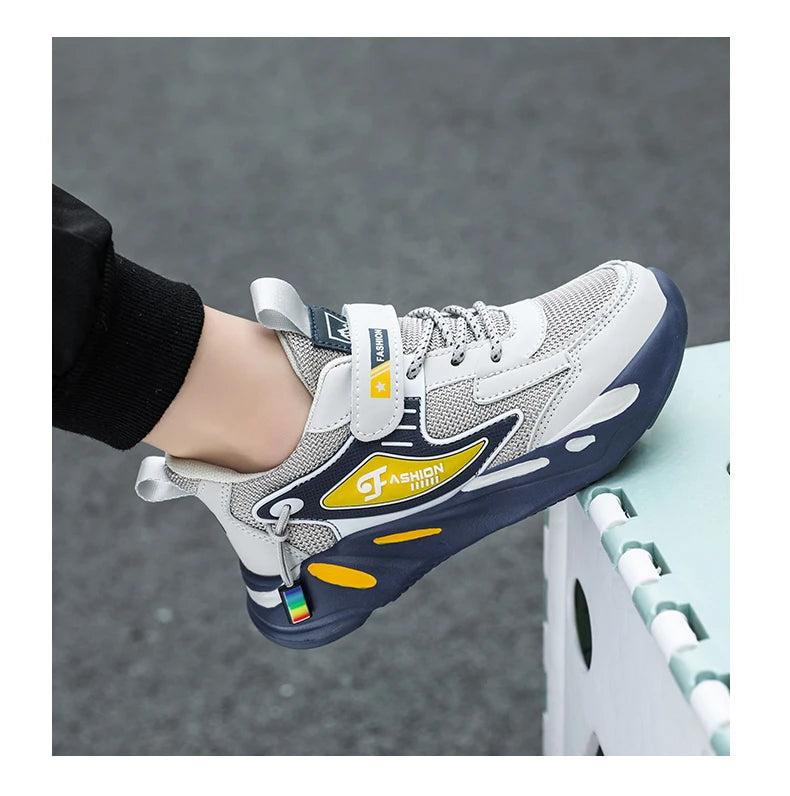 Boys’ breathable mesh sneakers by The Clothing Company Sydney, lightweight kids sports shoes with non-slip soles and hook & loop closure.