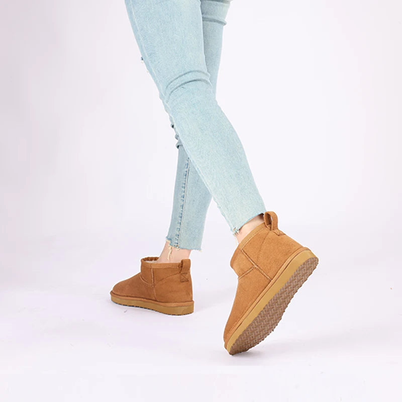 Women’s classic snow boots by The Clothing Company Sydney, warm ankle-length winter footwear with short, cozy design.