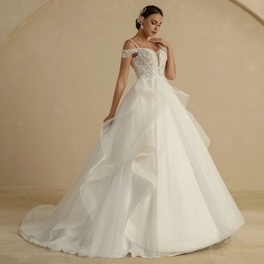 Ivory strapless A-line glitter wedding dress with off-the-shoulder design and bridal bling details, designed by The Clothing Company Sydney