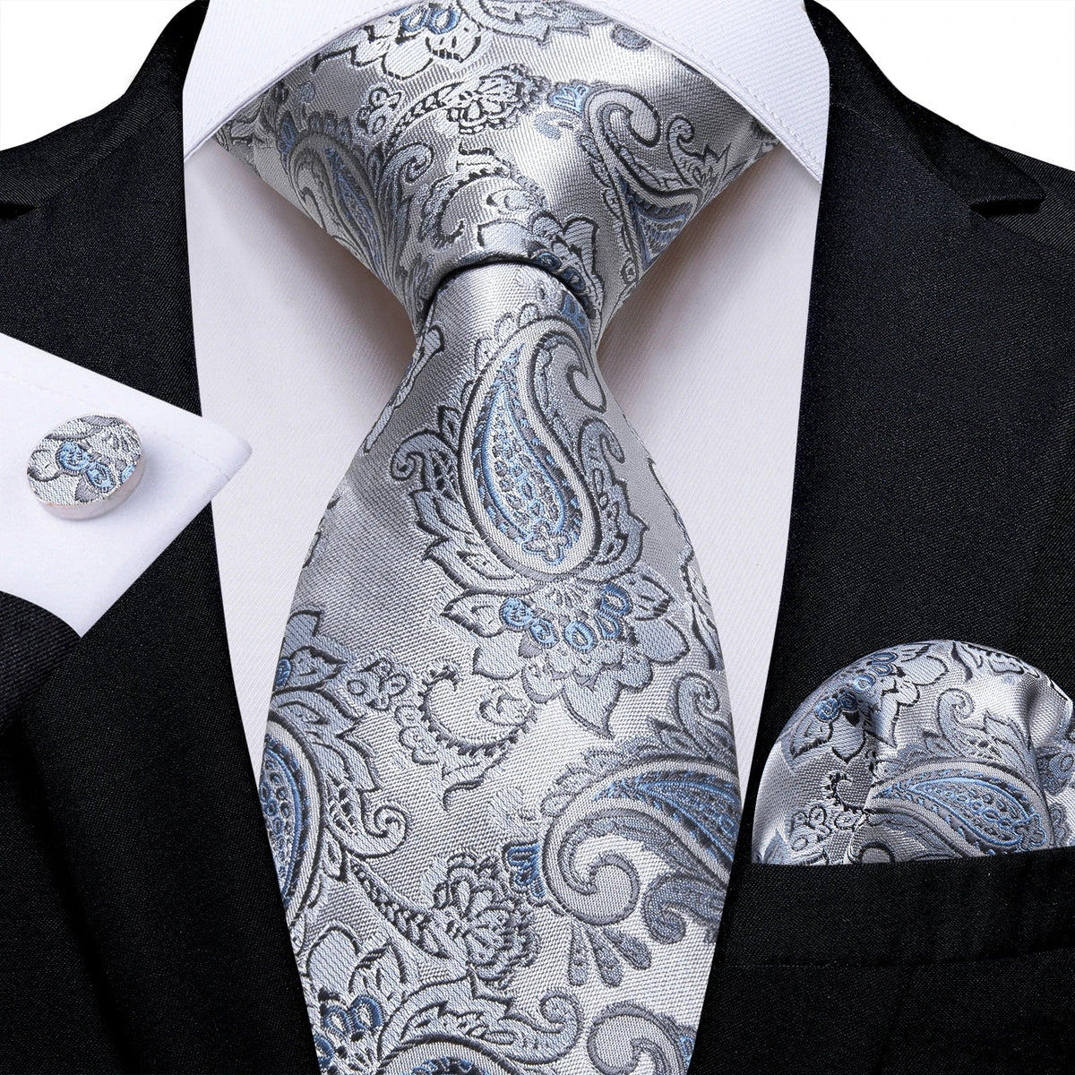 Men's gray paisley silk tie set with matching pocket square and cufflinks, ideal for wedding or formal occasions.