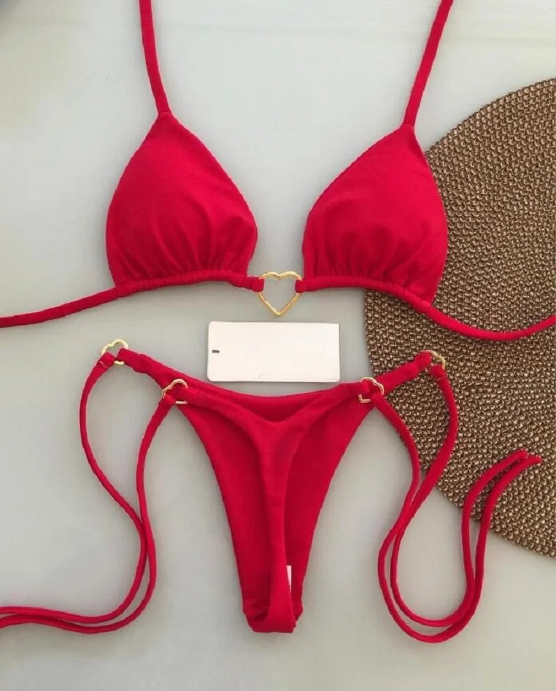 Solid color halter bikini set for women, two-piece swimsuit with triangle top and thong bottoms, by The Clothing Company Sydney.