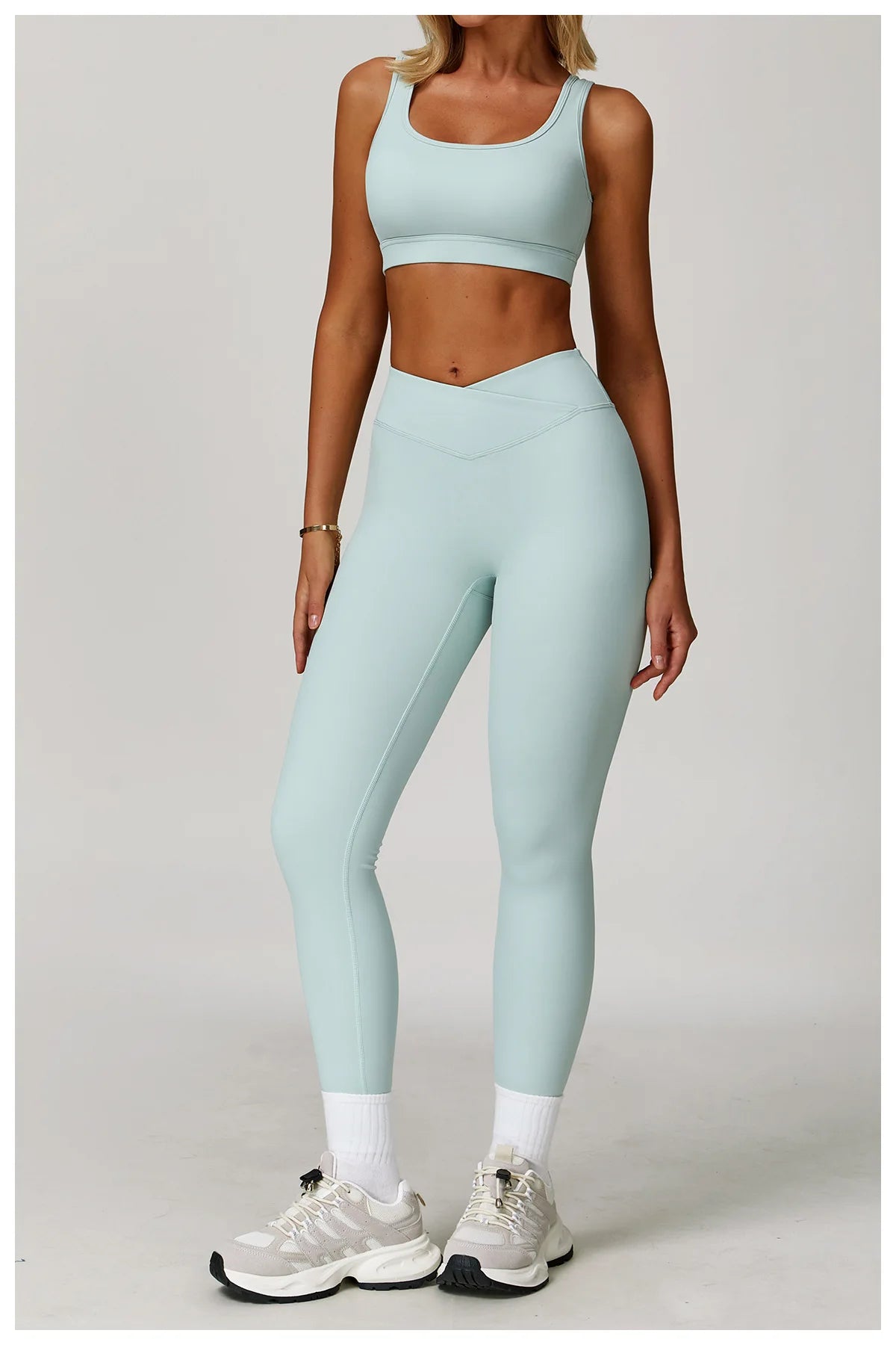 Women's fitness yoga and gym outfit set with sports bra and leggings from The Clothing Company Sydney, designed for workout and running.