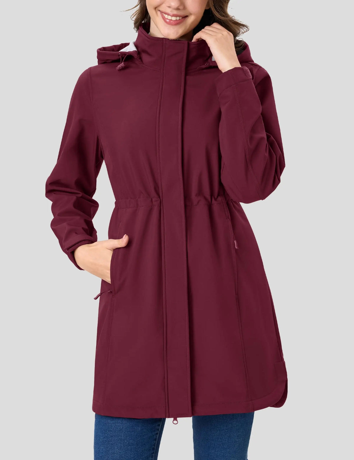 Women's fleece-lined softshell jacket from The Clothing Company Sydney with hood, windproof design, ideal for outdoor winter rain protection.