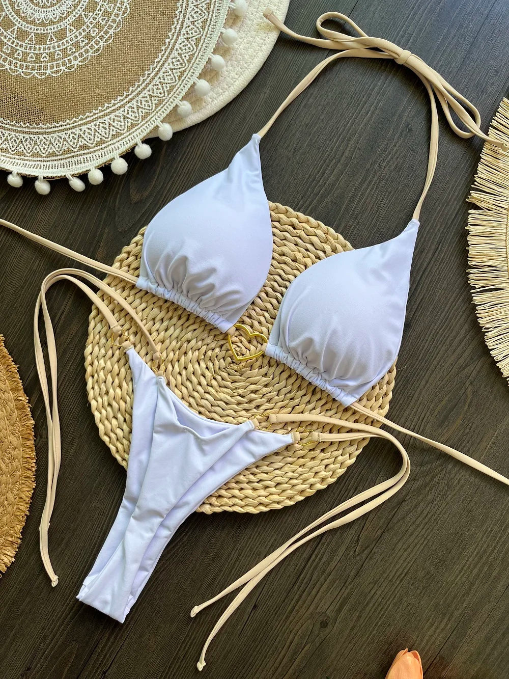 Solid color halter bikini set for women, two-piece swimsuit with triangle top and thong bottom, by The Clothing Company Sydney.