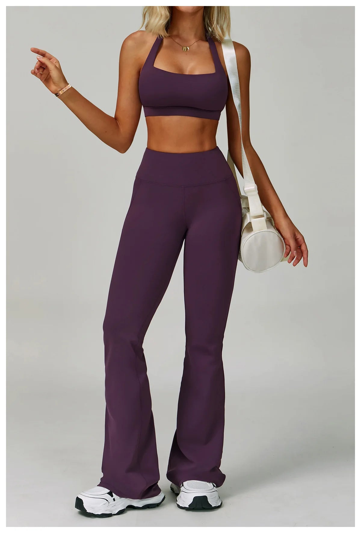Women's fitness tracksuit set with high-waist leggings and sports bra from The Clothing Company Sydney, ideal for yoga and workouts.