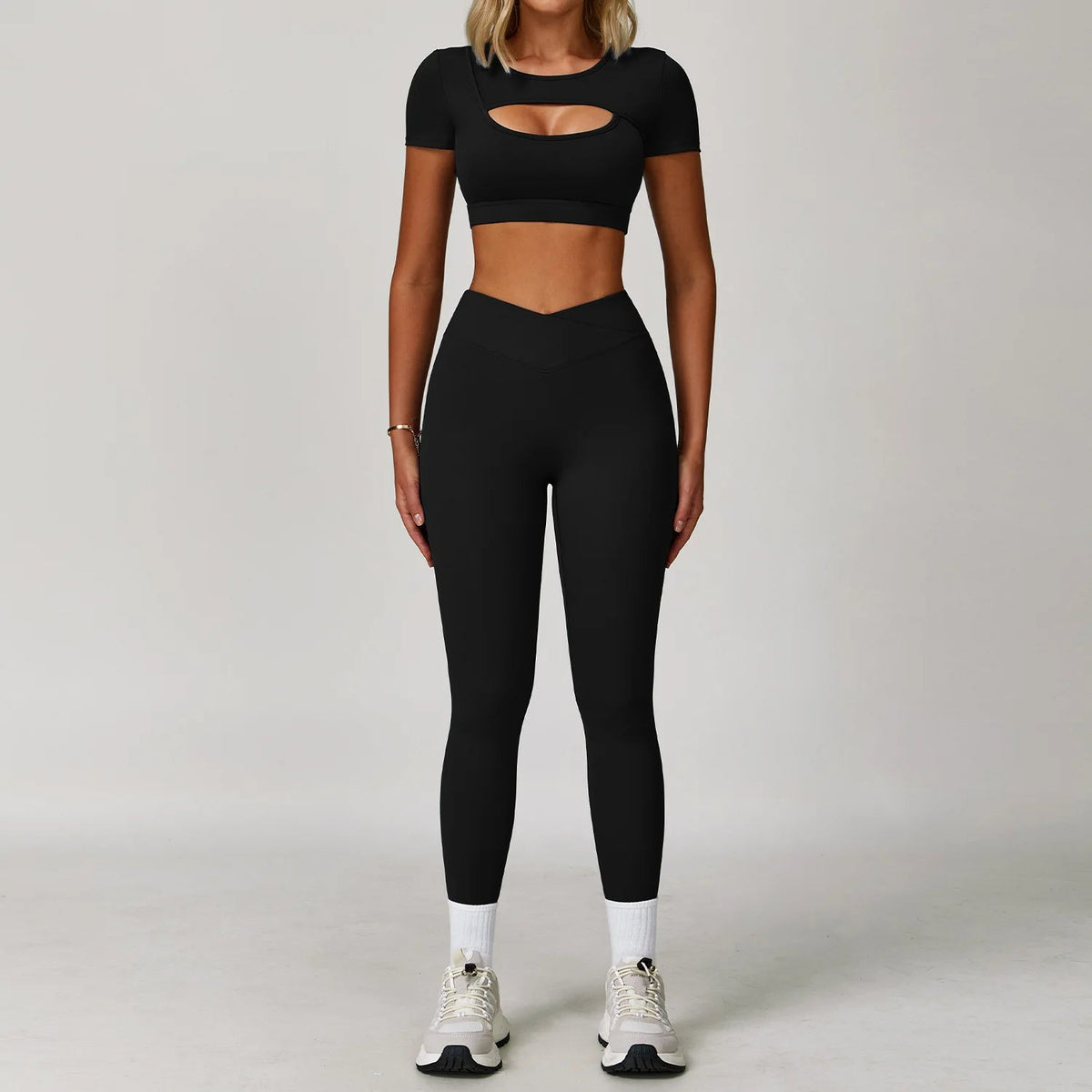 Two-piece women's fitness yoga and gym outfit by The Clothing Company Sydney, including sports bra and matching leggings.