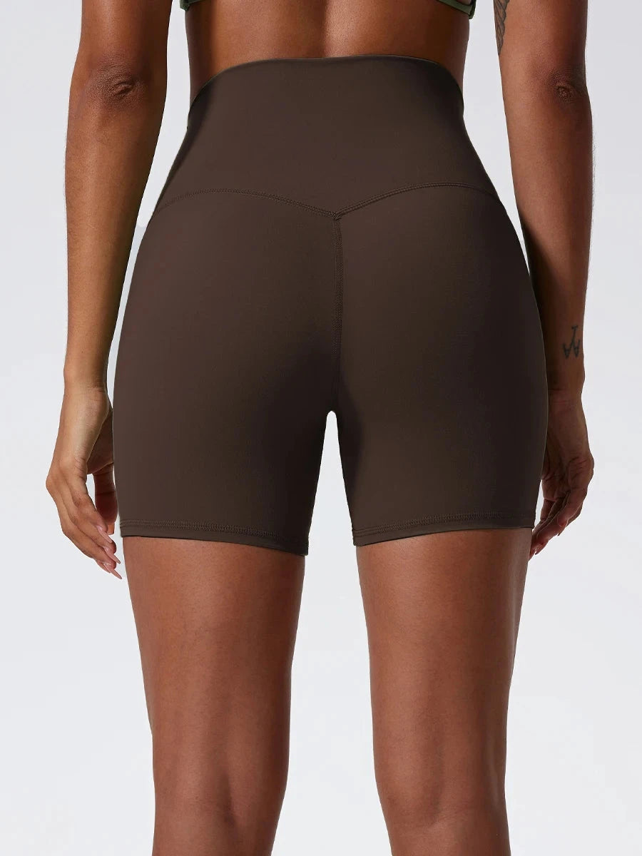 High-waist women's yoga shorts by The Clothing Company Sydney, designed for running and workout with a fitted athletic fit.