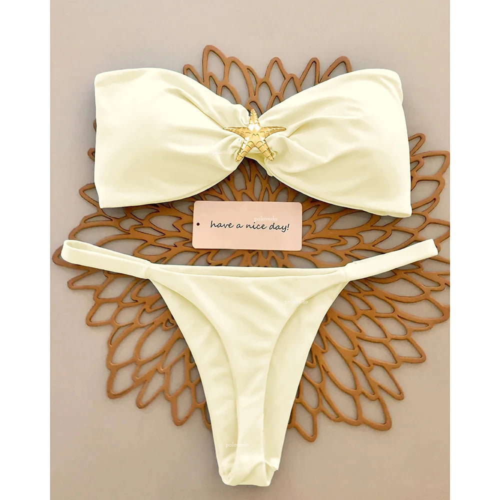 Two-piece push-up bikini swimsuit from The Clothing Company Sydney featuring a bandeau top and Brazilian-style bottoms on a model.
