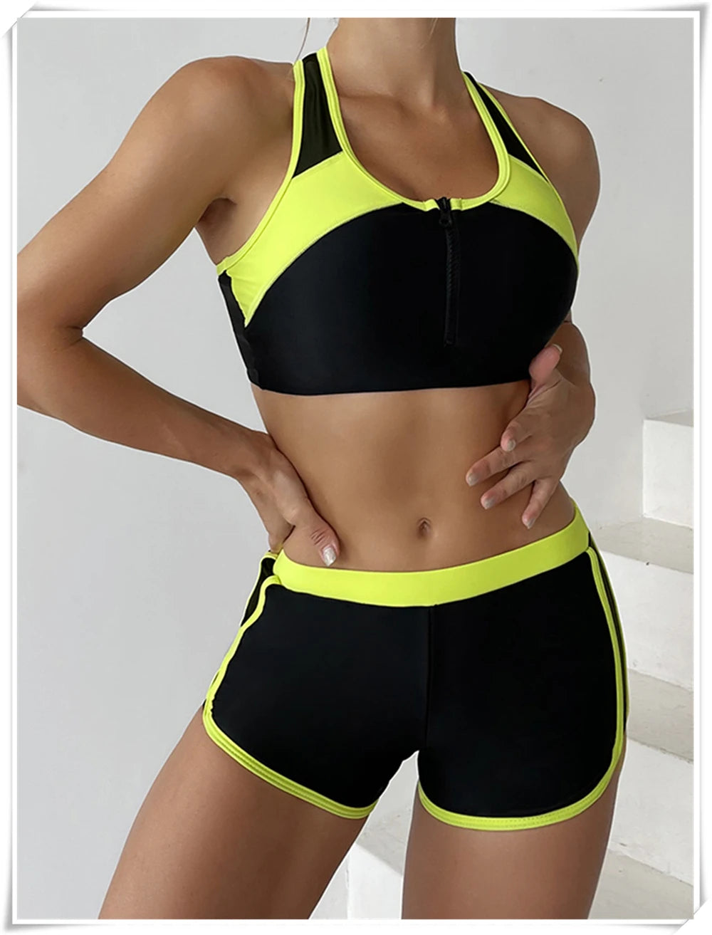 Two-piece swimsuit with zipper tankini top and high-waist shorts, perfect for summer beachwear and swimming by The Clothing Company Sydney