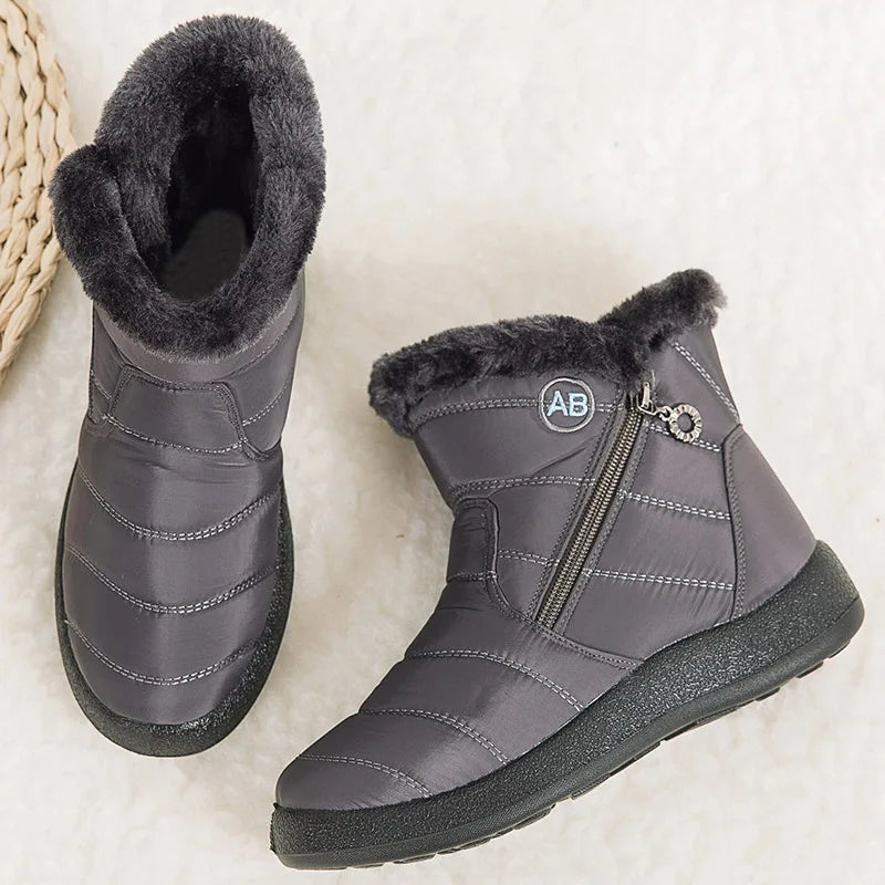 Women’s winter snow boots by The Clothing Company Sydney, warm fur-lined ankle footwear for cold weather.