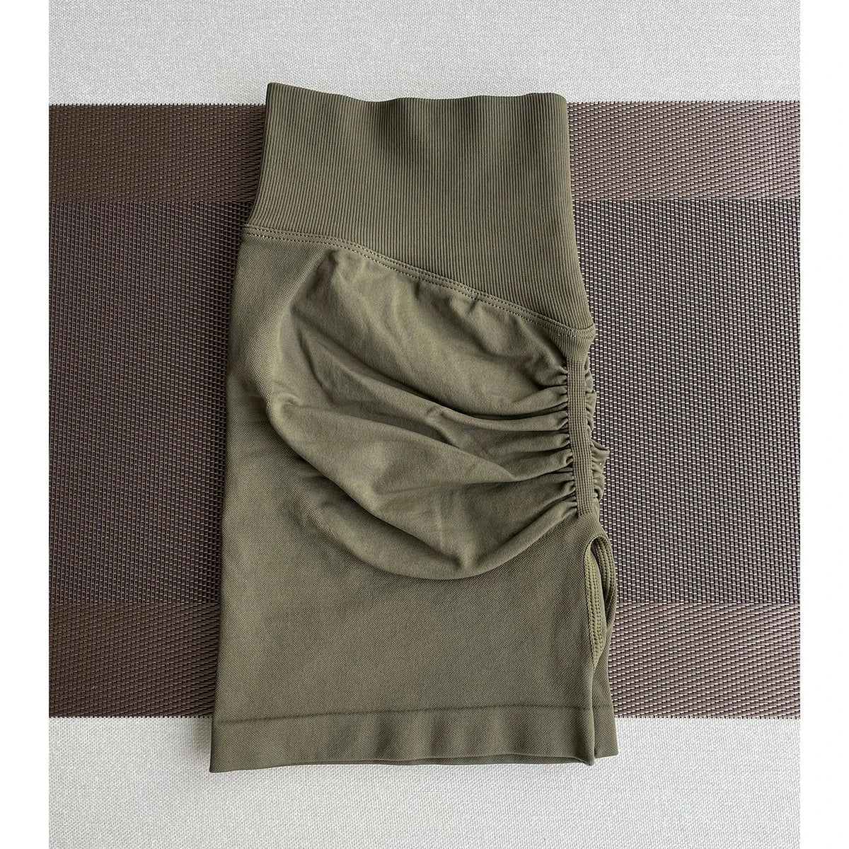 Solid seamless women's fitness half pants from The Clothing Company Sydney, ideal for yoga, gym, running, and biking workouts.