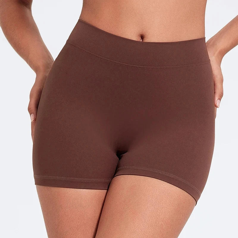 High-waisted V-back yoga shorts by The Clothing Company Sydney, fitted nylon fitness shorts for training and sports activities.