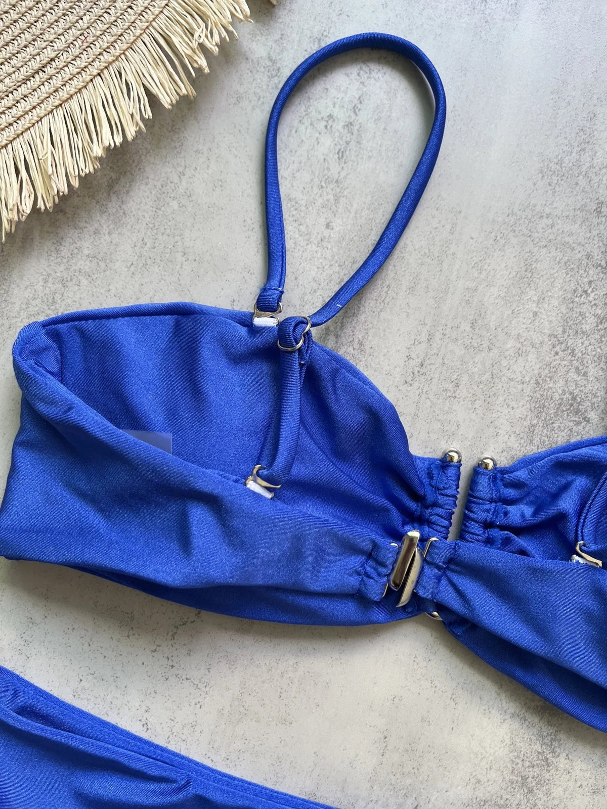 Two-piece bandeau bikini swimsuit by The Clothing Company Sydney featuring push-up top and thong bottom in solid beachwear style.
