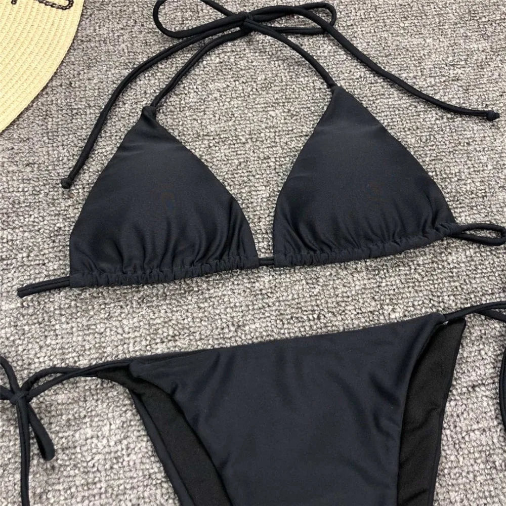 Neon pink Brazilian bikini set for women, halter style swimwear with two-piece design, from The Clothing Company Sydney.