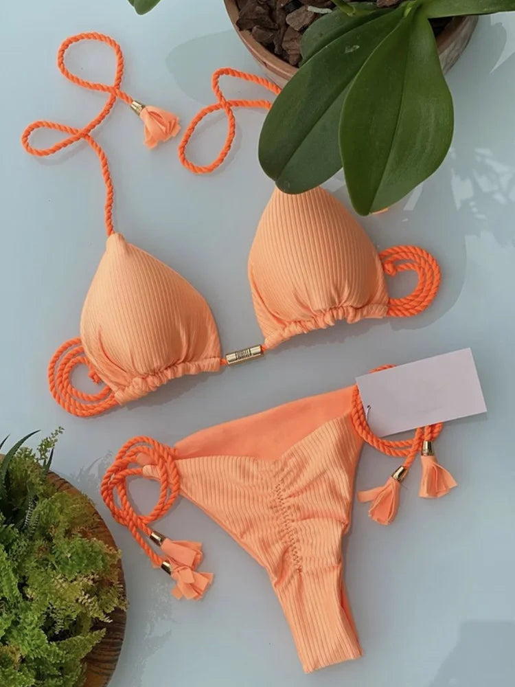Backless women's bikini swimsuit with rope triangle top and matching bottoms, from The Clothing Company Sydney.
