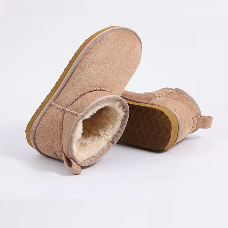 Women’s classic snow boots by The Clothing Company Sydney, warm short ankle-style footwear with rugged soles and cozy lining.