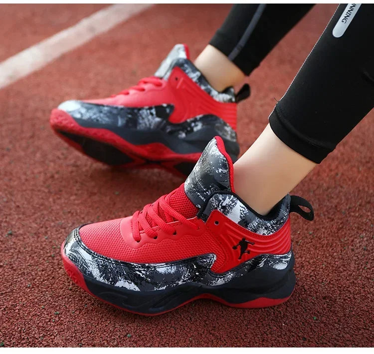 Kids basketball shoes from The Clothing Company Sydney featuring non-slip sports sneakers with vibrant design and sturdy sole.