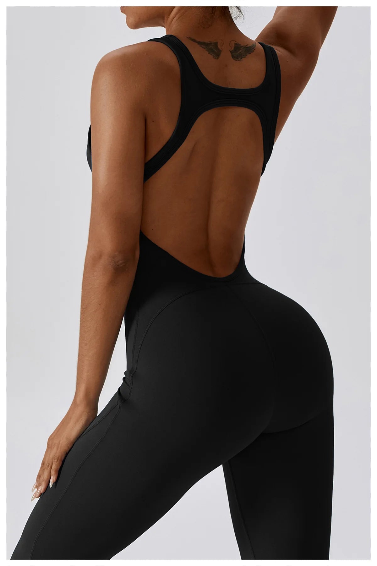 Open back V jumpsuit gym set for women, made by The Clothing Company Sydney, featuring stretch fitness bodysuit for training and yoga.