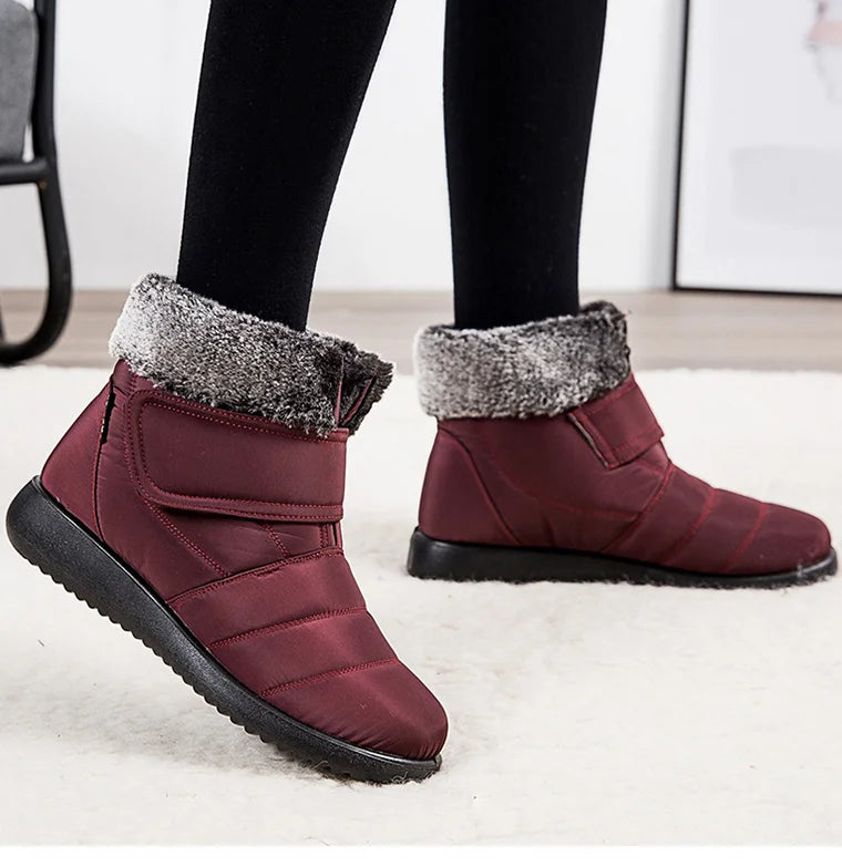 Women's fur-lined waterproof ankle boots by The Clothing Company Sydney with plush insoles and rubber soles for winter warmth.