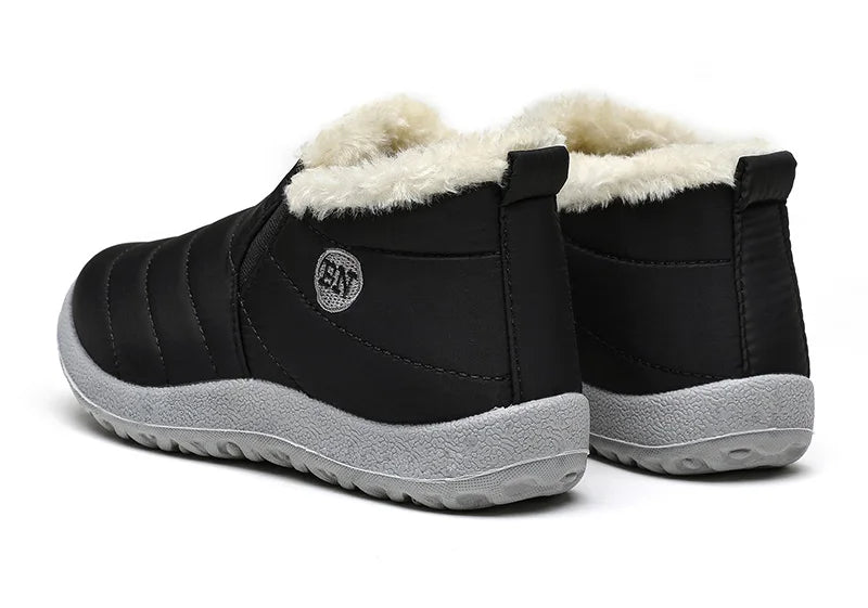 Men's winter ankle boots by The Clothing Company Sydney, slip-on waterproof snow shoes with fur lining and rugged soles.