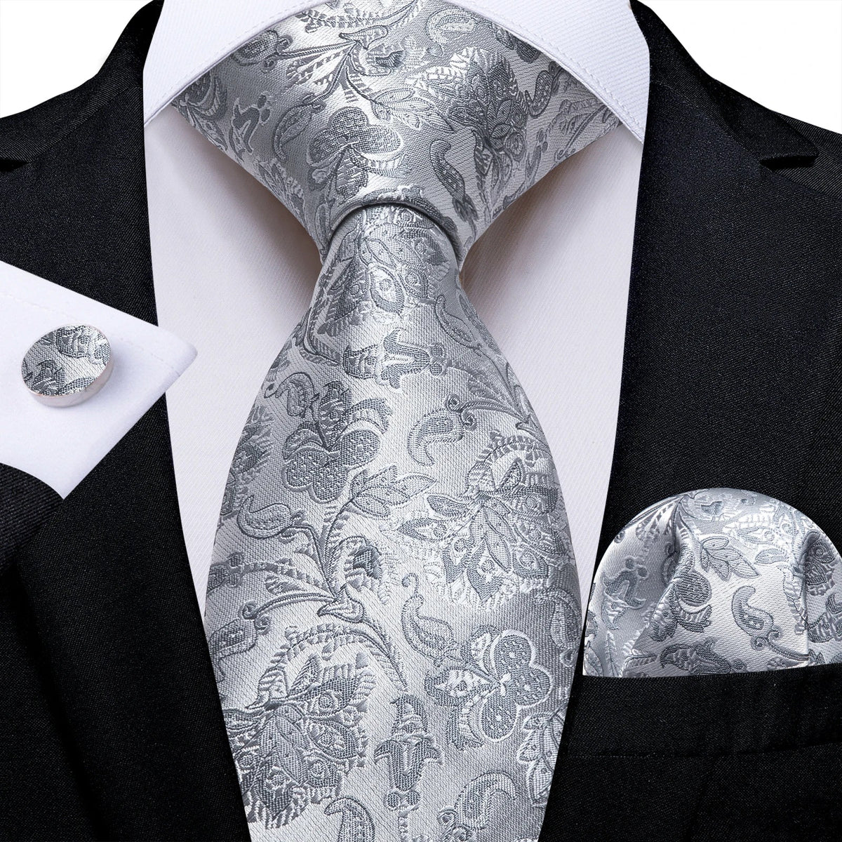 Men's gray paisley silk tie set with wedding tie, pocket square, and cufflinks from The Clothing Company Sydney, styled for formal occasions.